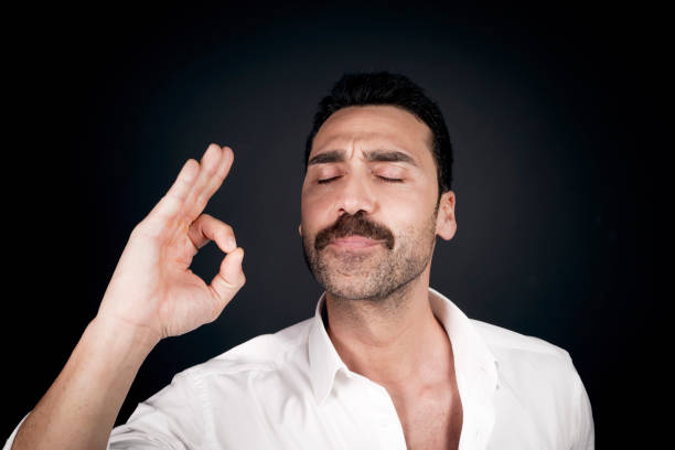 istock Young handsome man with beard and mustache studio portrait 942538844