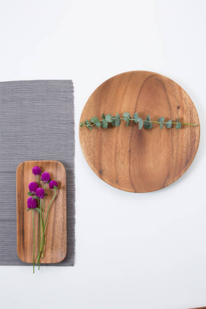 istock Wooden plates on white background 942540554