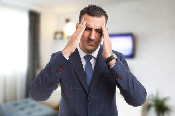 istock Real estate agent or Real Estate Agent feeling strong migraine 942546232