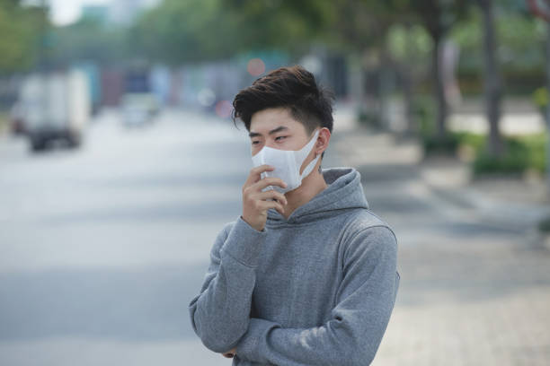 istock Young man wearing face mask 942547766