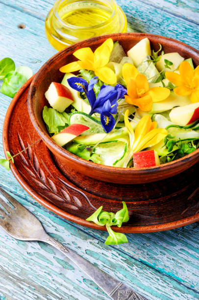 istock Fresh vegan salad with edible flowers 942551080