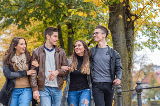 istock Cheerful friends in town 942552350