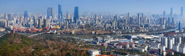 Wuxi Skyline Panoramic picture of Wuxi downtown as view from Xi Shan mountain wuxi photos stock pictures, royalty-free photos & images