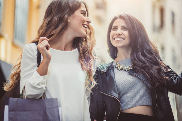 istock Young Women Shopping in Old Town 942564266