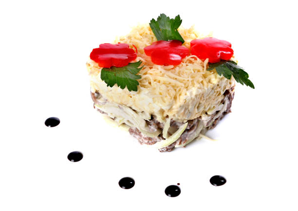 Salad of beef, cherry tomatoes, vegetables and cheese isolated over white background