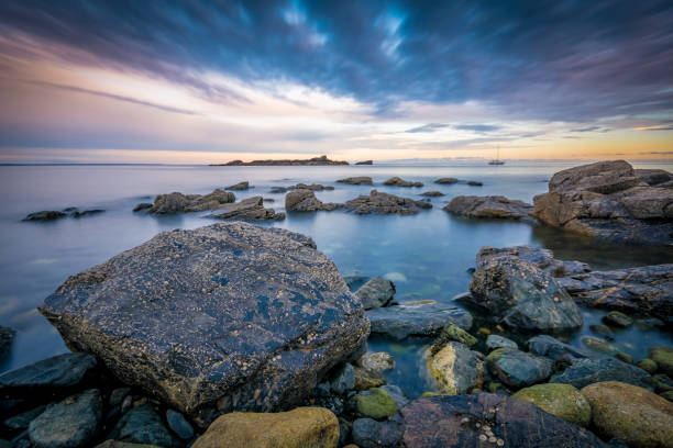 istock Clear calm ocean around the rocks at Picturesque Mousehole, Cornwall 942584562