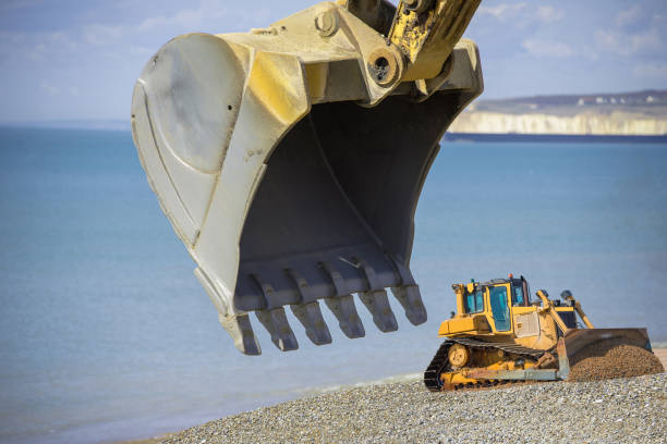 istock Heavy Plant - Construction - Construction Site - Sea Defence works 942588536