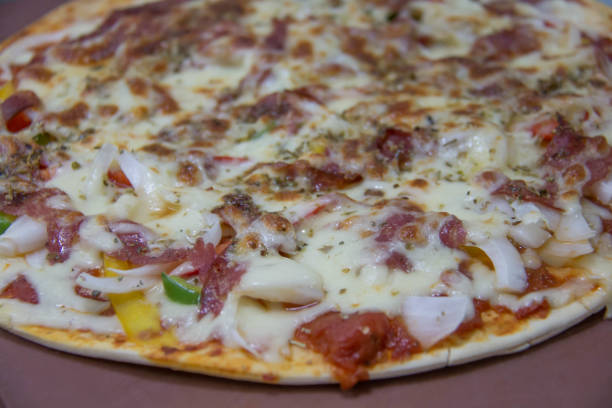 istock slice of Hot Pizza on the  table 942591190