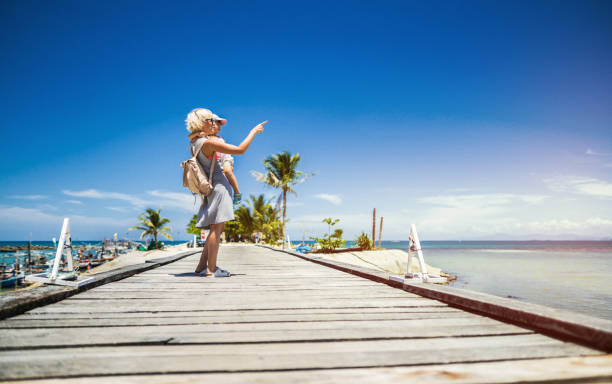 istock Standing on the pier near ocean 942595384
