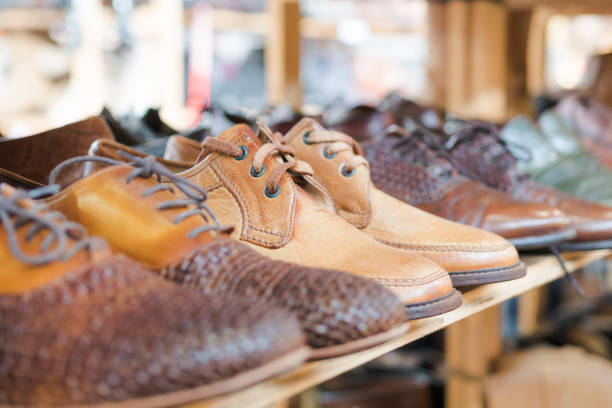 istock Men's shoes on shelf. 942599322