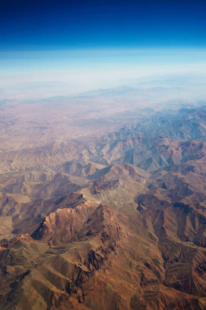 istock aerial panoramic view at mountain range from airplane above afghanistan 942602322