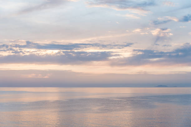 istock Light Pink and Blue Sunset on Mirror Sea 942602778