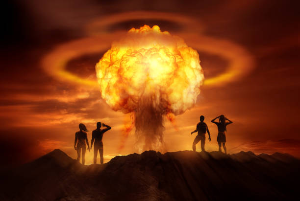 Apocalyptic Nuclear Bomb People watching the end of the world as a nuclear bomb explodes in front of them. Mixed media illustration. hydrogen bomb stock pictures, royalty-free photos & images