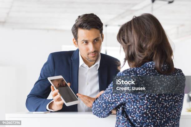 Business Colleagues Working Together In Office Stock Photo - Download Image Now - Digital Tablet, Corporate Business, Finance