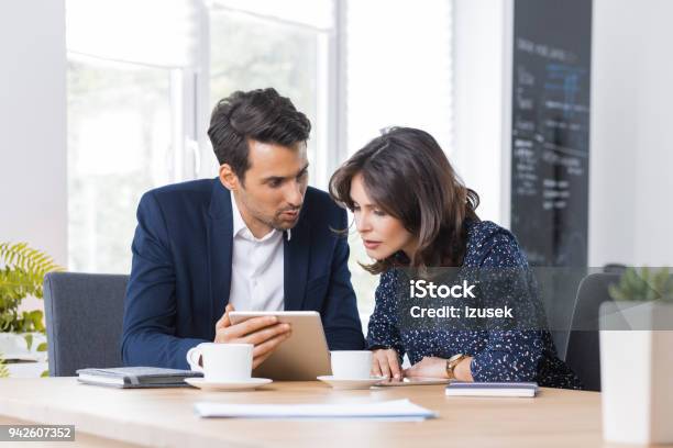 Business Couple Having Lunch Meeting Stock Photo - Download Image Now - Adult, Adults Only, Advice