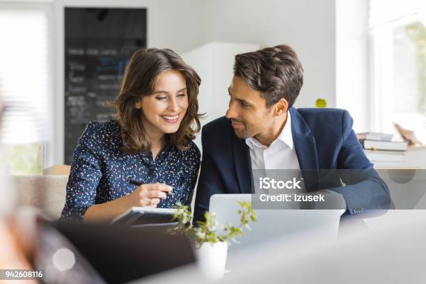 Modern Business People Working At A Cafe Stock Photo - Download Image Now - Adult, Adults Only, Advice