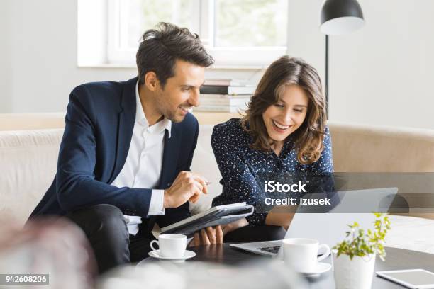 Modern Business People Working At A Cafe Stock Photo - Download Image Now - Business, Advice, Financial Advisor