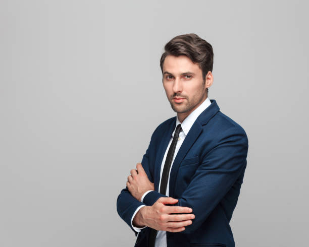 istock Portrait of elegant young man in suit 942608438