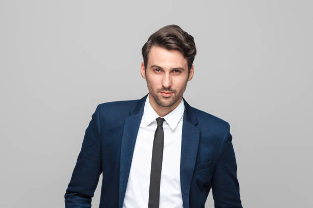 istock Portrait of elegant young man in suit 942610254