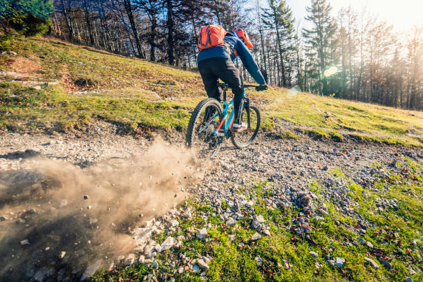 istock Man riding mountain bike 942619734