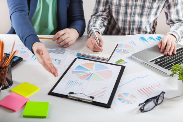 istock Stock market chart and finger pointing 942619838