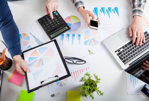 istock Stock market chart and finger pointing 942622568