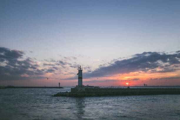 istock lighthouse in sea during sunset in Istanbul, Turkey 942627742