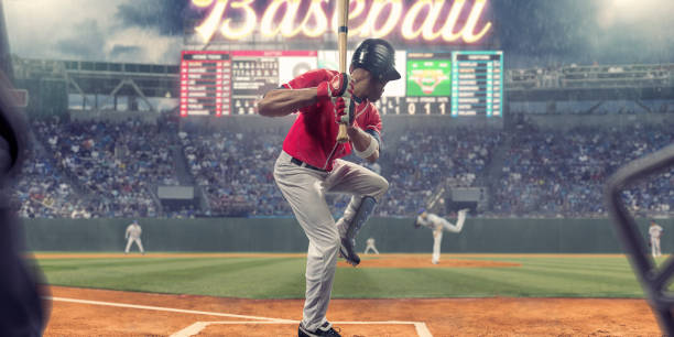 istock Baseball Player About To Strike Ball During Baseball Game 942628008