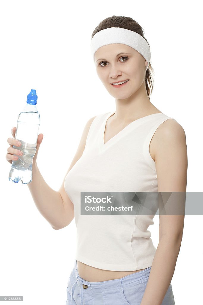 Женщина держит бутылку с чистой воды - Стоковые фото Белый роялти-фри