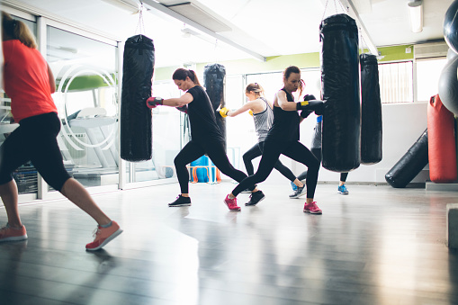 Group of women practicing boxing in the gym