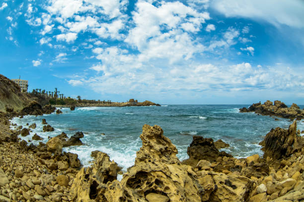 istock sea surface and sunny summer rocky coastline 942638718