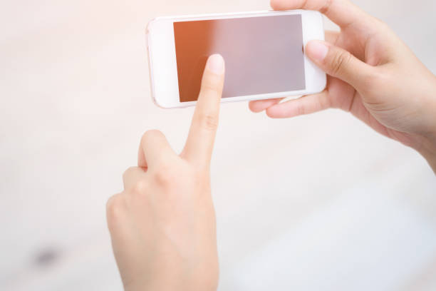 istock Woman use mobile phone in the city 942641882