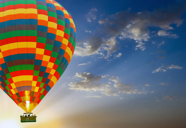 istock sunset Hot air balloons landing 942641906