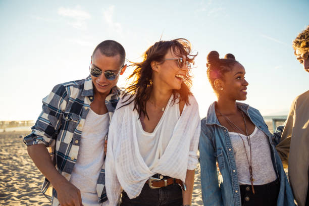 istock Friends in Los Angeles having fun on the beach 942642164