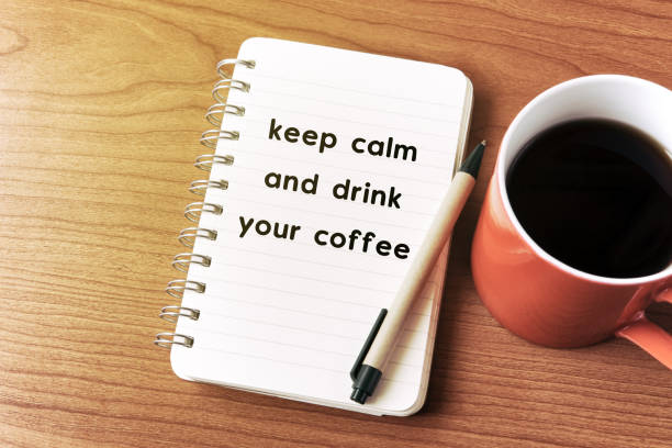 istock Inspirational quote on notepad - Keep calm and drink your coffee 942642740