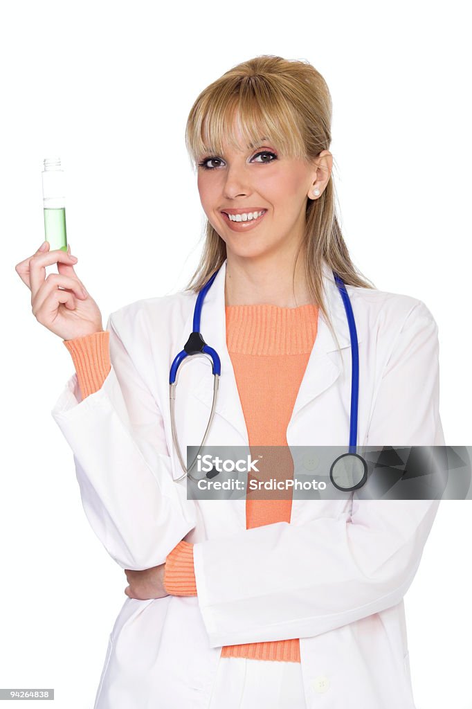 Médico feminino segurando um tubo de ensaio, isolados no fundo branco - Royalty-free Doutor Foto de stock