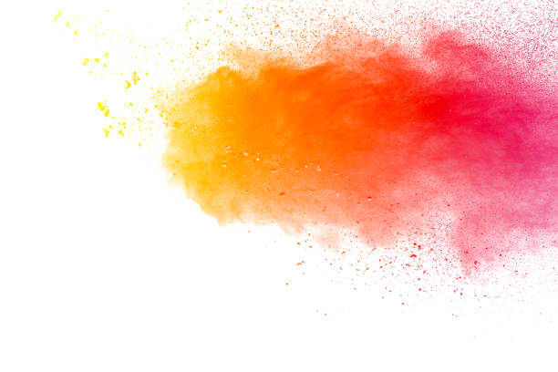 istock abstract orange dust explosion on white background. abstract orange powder splattered on white background, Freeze motion of orange powder splashing. 942649972