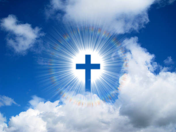 istock Christian Cross in Sky Background 942655490