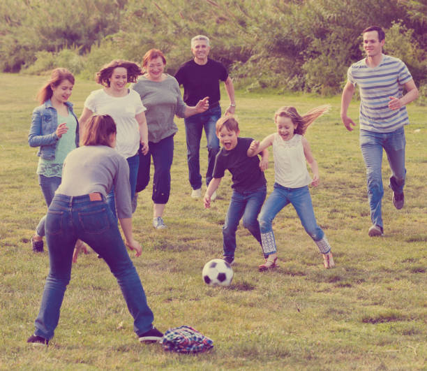 istock Friendly and glad family scoring goals 942658614