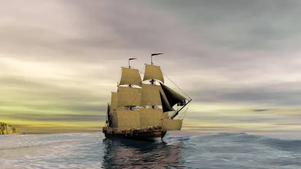Pirate ship at full sails on a beautiful sunrise