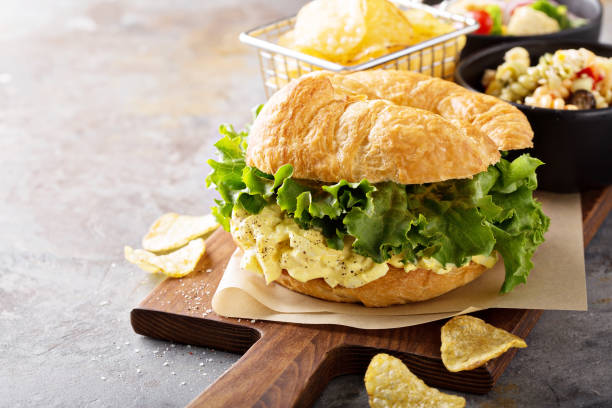 istock Egg salad sandwich on croissant 942665400