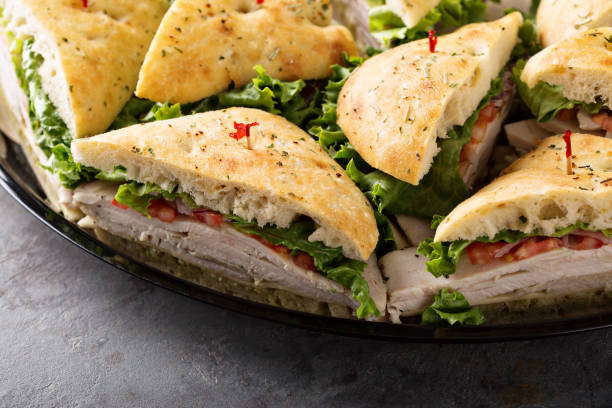 istock Tray of turkey sandwiches 942666272