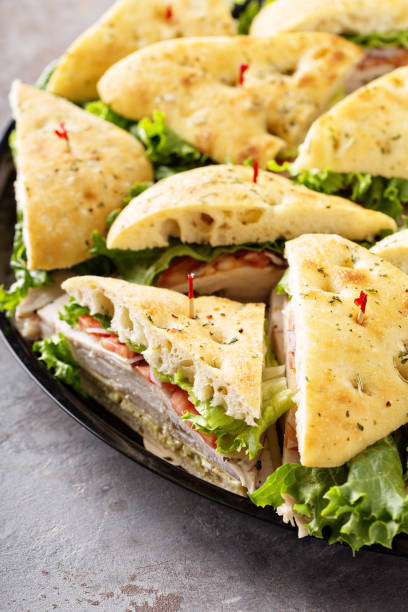 istock Tray of turkey sandwiches 942666406