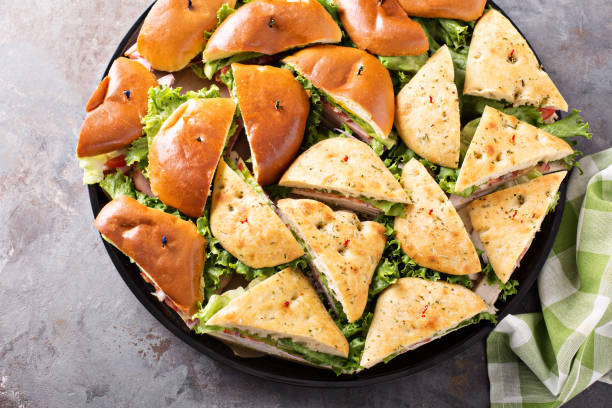 istock Tray of turkey and ham sandwiches 942667134