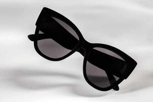 istock Flying women's sunglasses in a really black frame covered with velvet 942670334