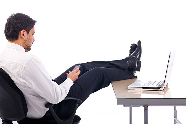 istock Young business man relaxing at office 94267217