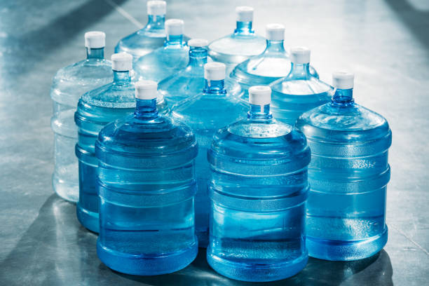 istock Delivery concept with large blue water bottles 942673144