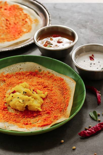 Mysore Masala Dosa served with sambar and chutney, selective focus