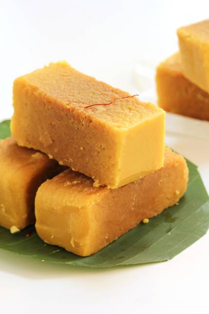 istock Mysore Pak isolated on white / indian festival sweets 942686800