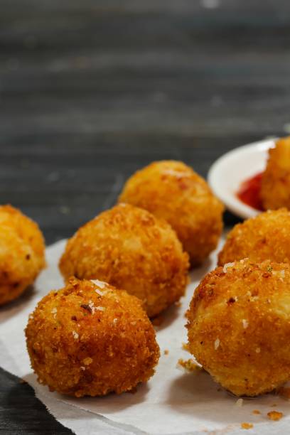 istock Potato Croquette -Bread crumbed fried food roll 942689412